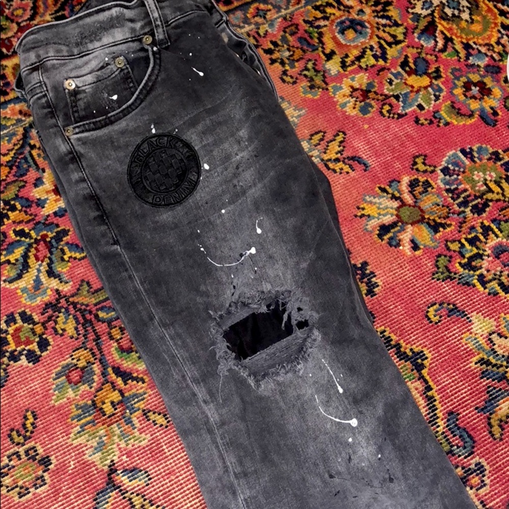Black painted distressed jeans